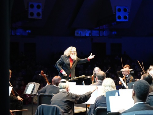 Conductor leads orchestra