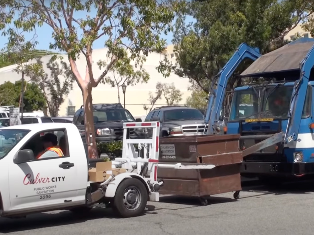 Culver City trash truck picking up trash bin