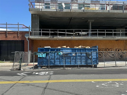 Trash bin at construction site